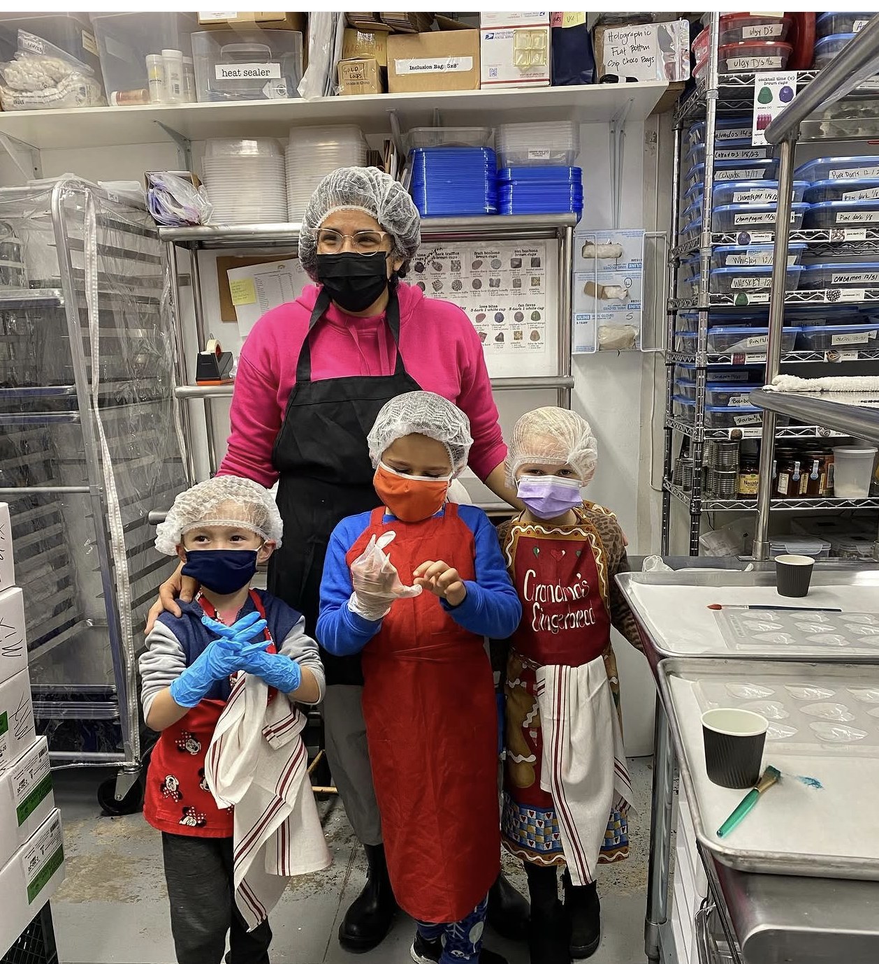 Family in the chocolate-making kitchen